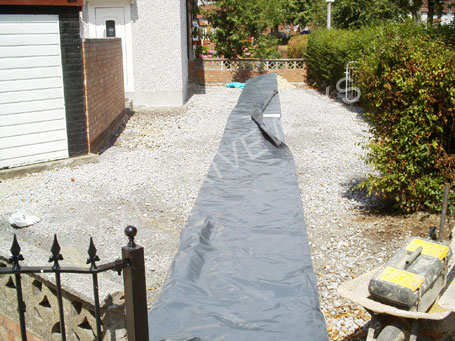 Process of a block paved front garden, with new step entrance to property.