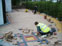 Thumbnail of the process of a block paved front garden, with new step entrance to property.