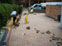 Thumbnail of the process of a block paved front garden, with new step entrance to property.