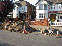 Thumbnail of the process of a block paved front drive with an added flower bed feature.